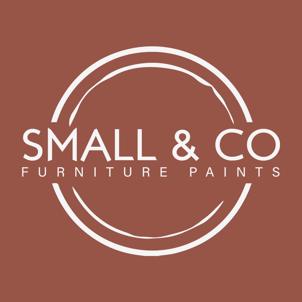 Small and co furniture paint logo over Potter's wheel terracotta red colour