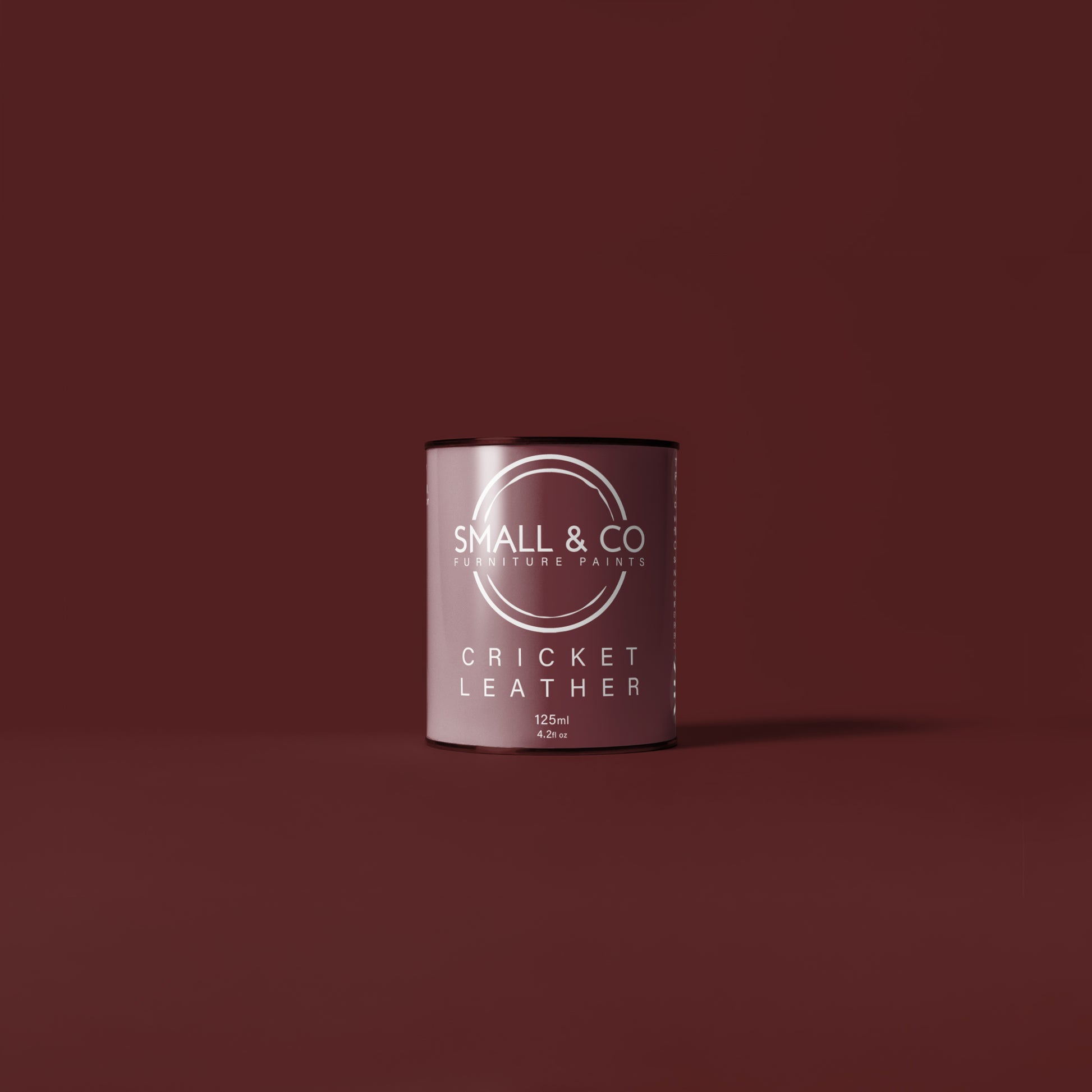 125ml tin tester pot of Small & Co furniture paint in Cricket Leather, a dark red burgundy colour. Premium, compact small project size paint perfect for small furniture restoration projects, touch-ups, and detailed work. Suitable for wood, metal, and various surfaces. Eco-friendly, easy to apply, and provides a smooth, professional finish. Available at Small & Co. Ideal for DIY enthusiasts and home decorators.