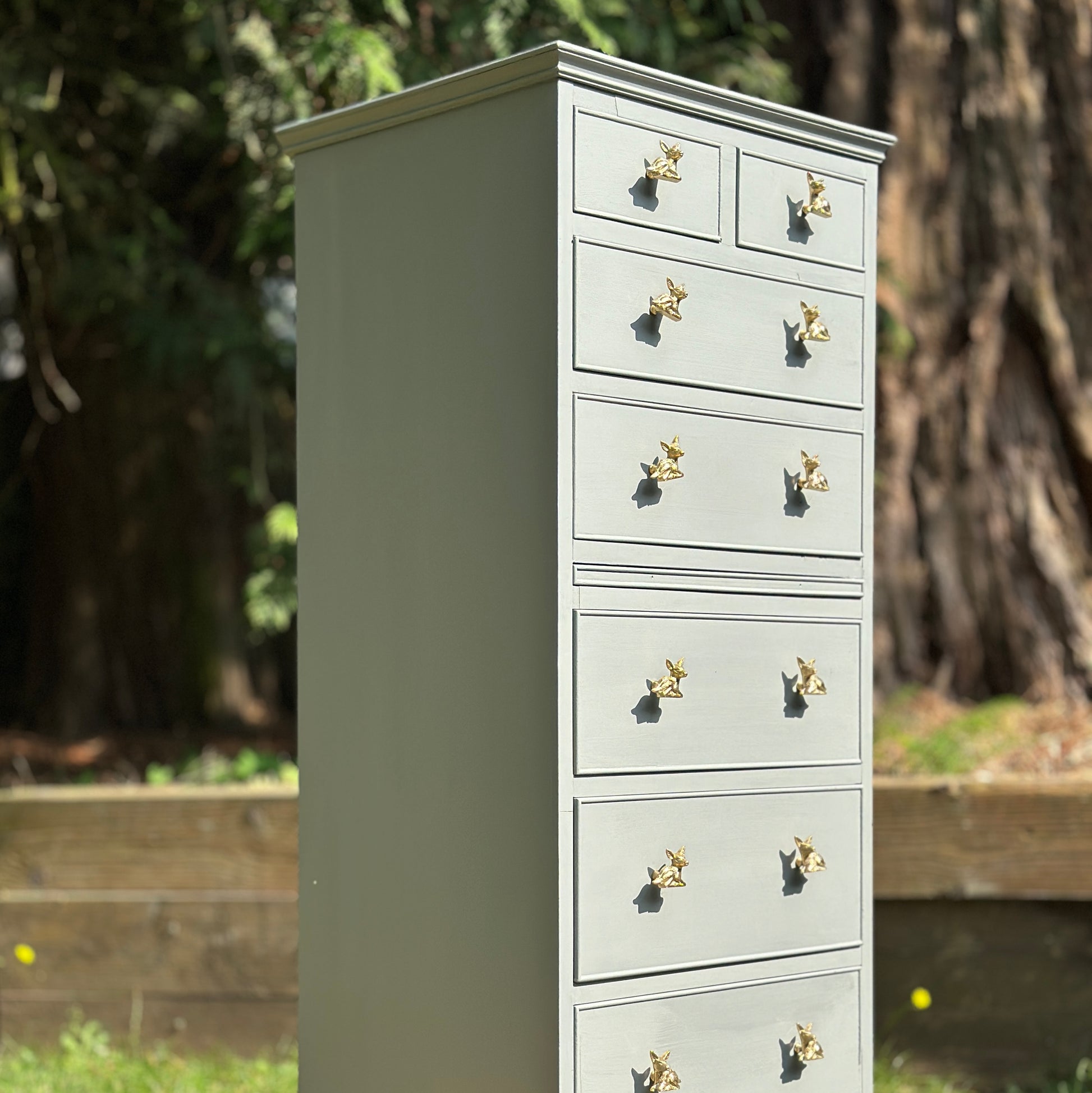 highland haze, light mid grey furniture paint, painted chest of drawers with brass deer handle, paint by small and co furniture paints, zoomed out