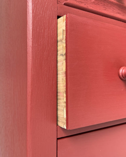 Detail of dovetail drawer joints and rich matte finish achieved with Cricket Leather red furniture paint by Small & Co