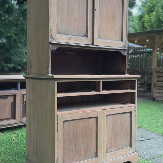 Large dresser cabinet being hand painted in a light taupe nutty colour called Wren's nest made by small and co furniture paints, uk made paints