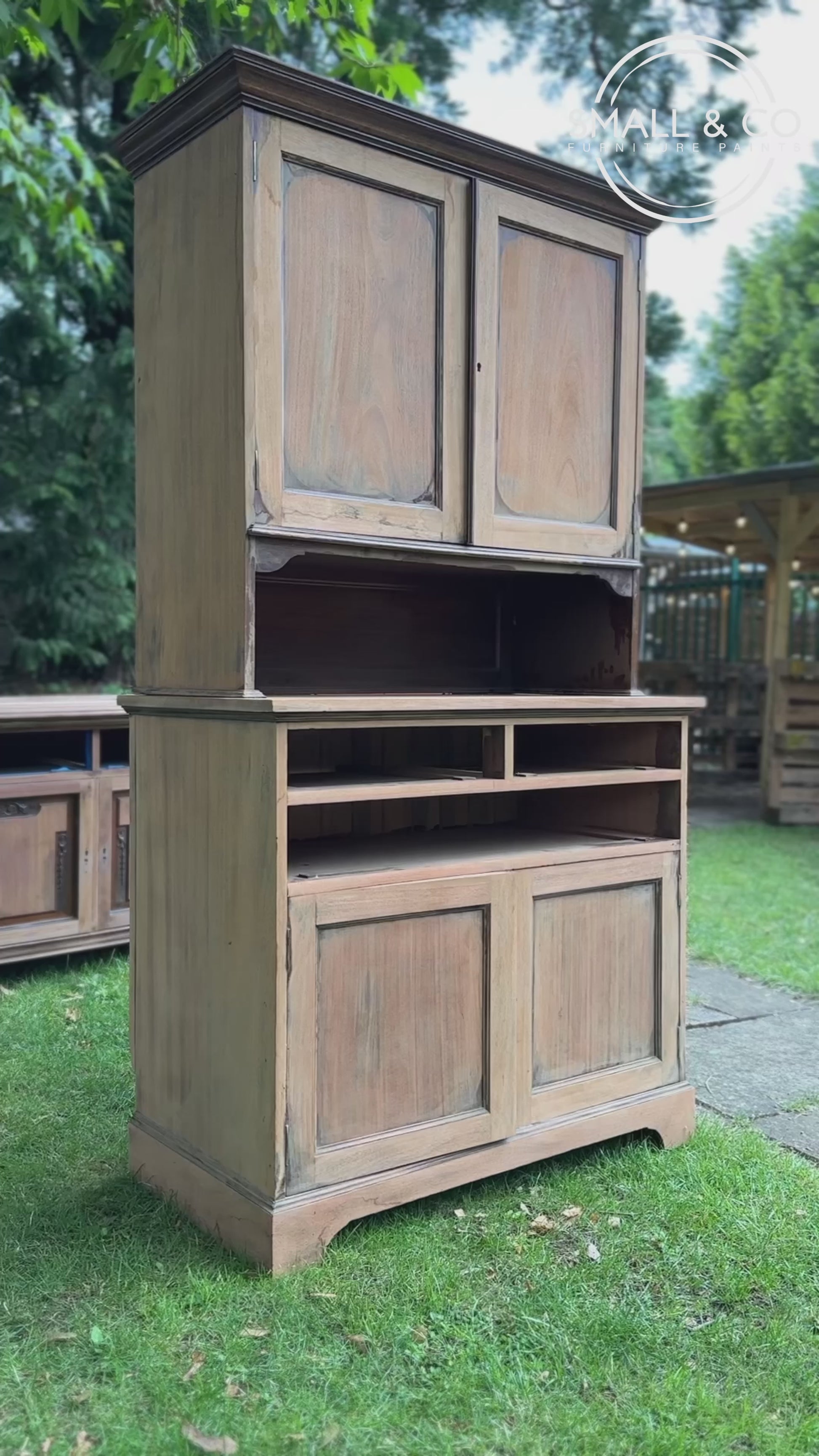 Large dresser cabinet being hand painted in a light taupe nutty colour called Wren's nest made by small and co furniture paints, uk made paints